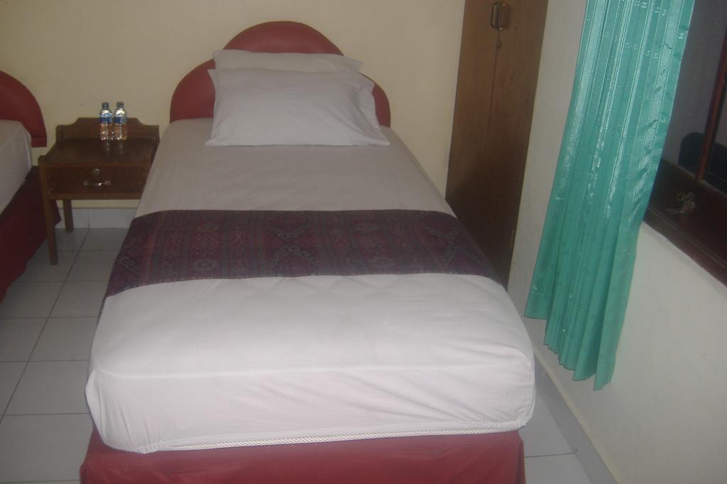 Mustika Inn Kuta  Phòng bức ảnh