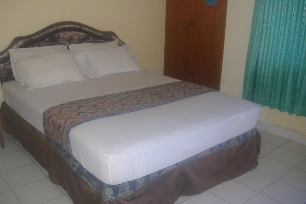 Mustika Inn Kuta  Phòng bức ảnh