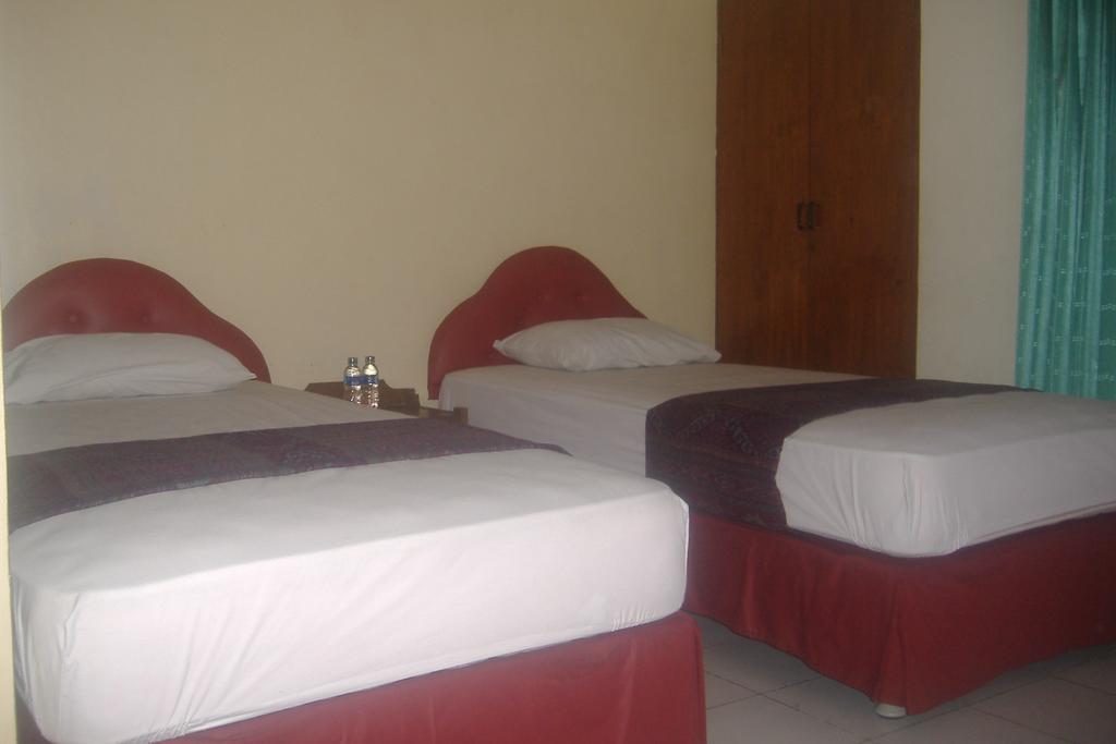 Mustika Inn Kuta  Phòng bức ảnh
