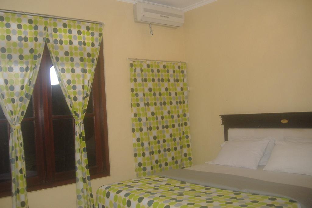 Mustika Inn Kuta  Phòng bức ảnh