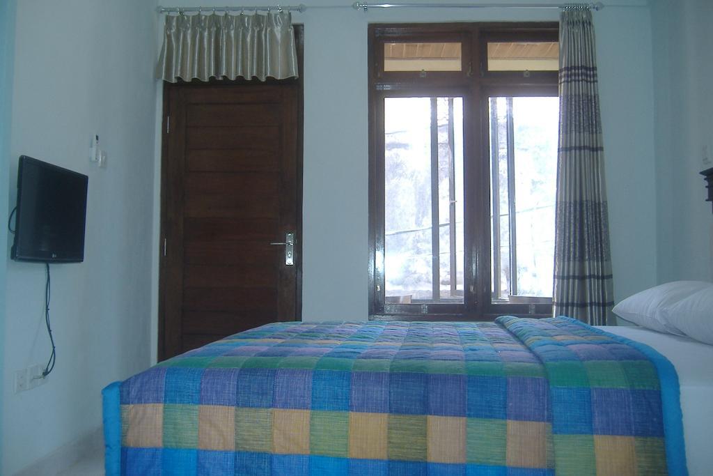 Mustika Inn Kuta  Phòng bức ảnh