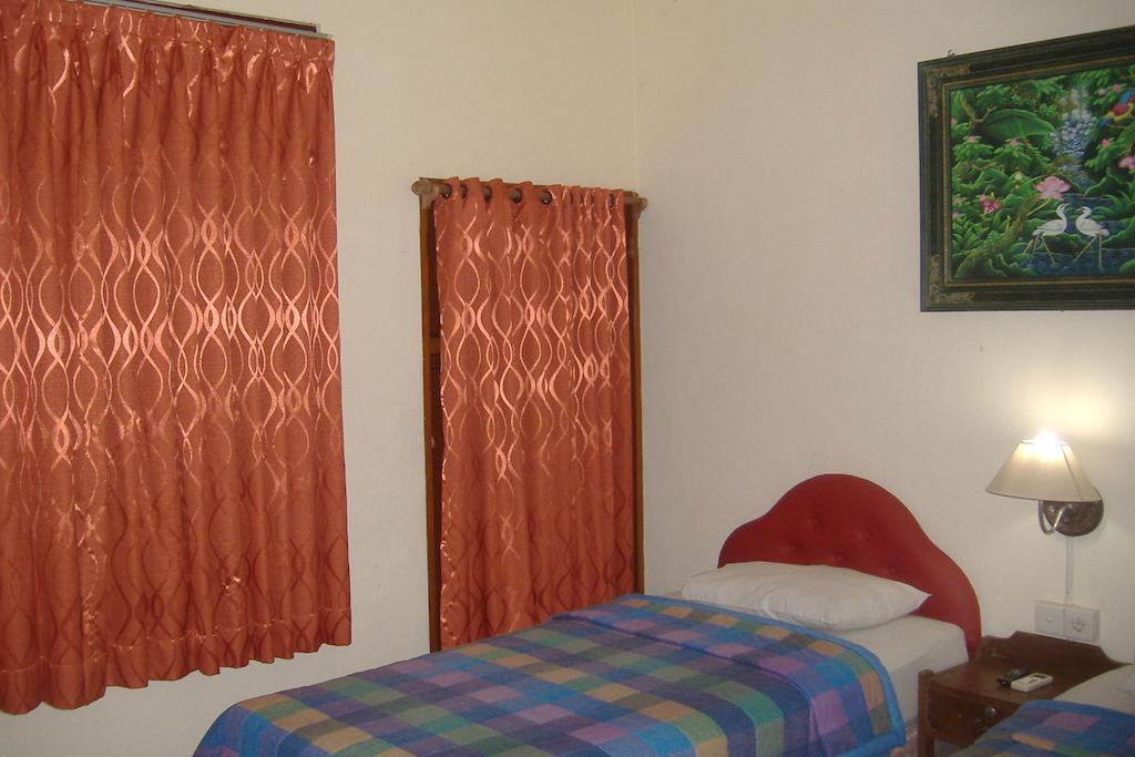 Mustika Inn Kuta  Phòng bức ảnh