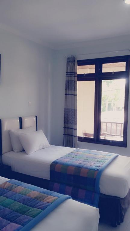 Mustika Inn Kuta  Phòng bức ảnh