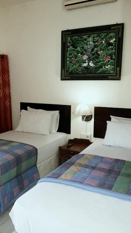 Mustika Inn Kuta  Phòng bức ảnh
