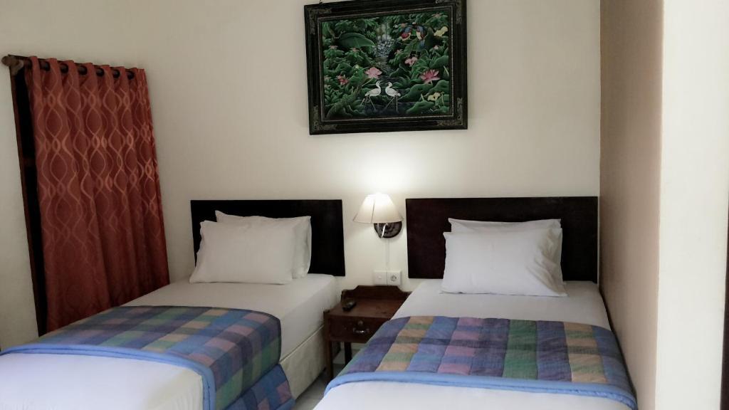 Mustika Inn Kuta  Phòng bức ảnh