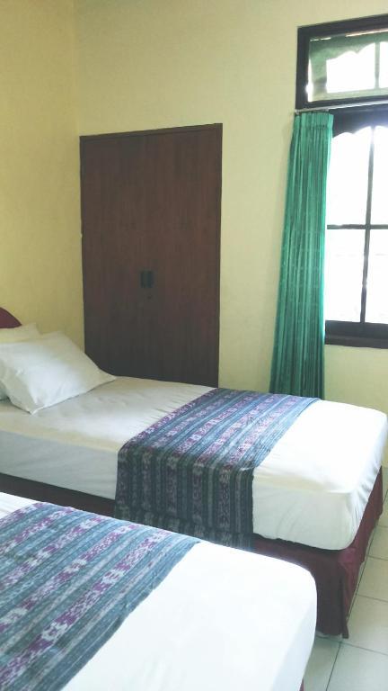 Mustika Inn Kuta  Phòng bức ảnh