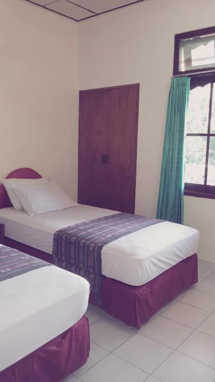 Mustika Inn Kuta  Phòng bức ảnh